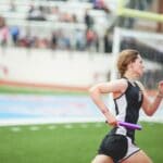 woman running on field